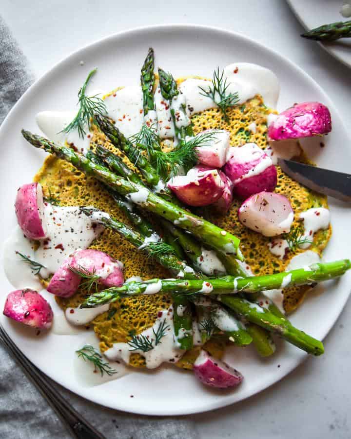 Hearty Herbed Chickpea Pancakes with Zesty Lemon Tahini & Roasted Spring Vegetables